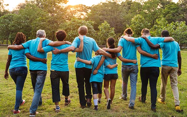 group of people wearing blue for random acts of kindness day